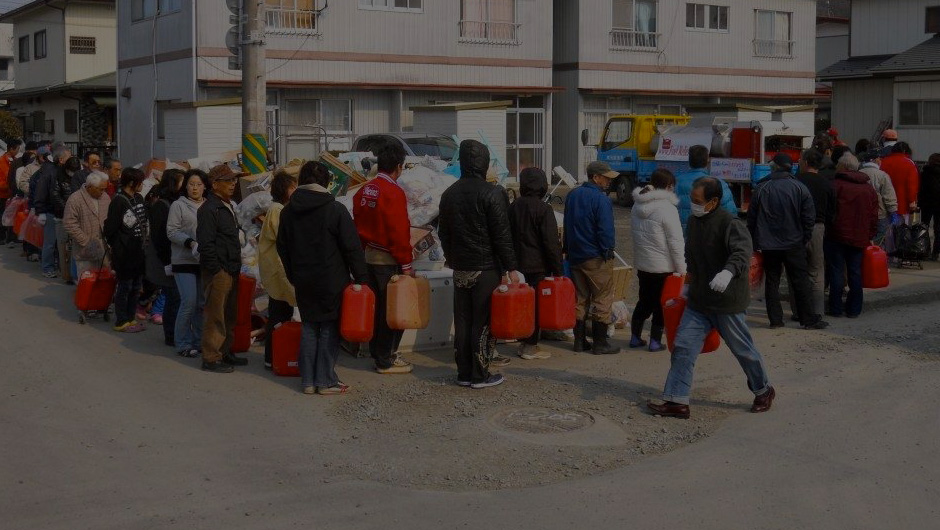 Japanese citizens waiting in line for fuel