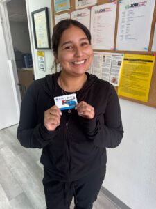 Photo of a young woman with a prepaid gift card