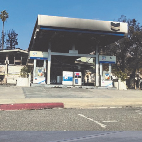 Photo of a burned out Chevron service station