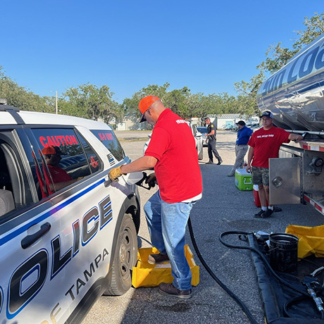 Volunteers filling up emergency vehicles